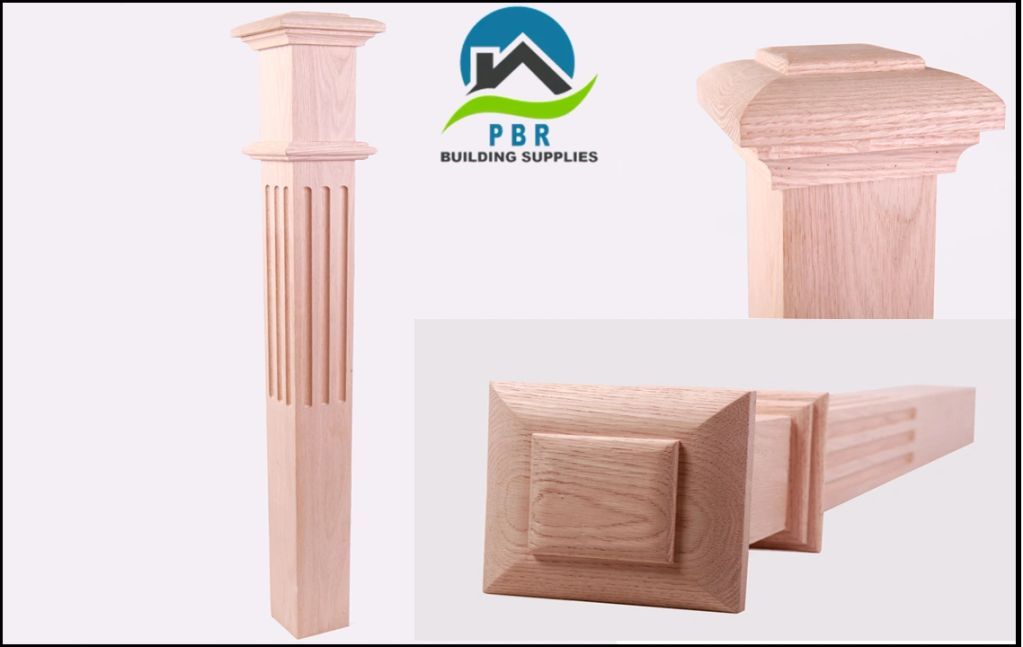 Decorative wooden newel post with fluted design and square base.