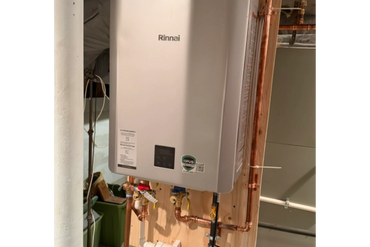 Magnified close-up of textured stone surface with a magnifying glass.