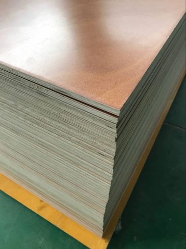 Sheets of varnished plywood