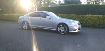Mercedes car for sale against a hedge on a tarmac road in Roxton Bedford, buy a car sell a car cars