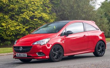 Red Vauxhall Corsa Car standing on tarmac road in Roxton Bedford buy a car, sell a car, Cheap car