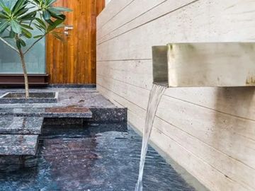 Entranceway Custom Water Feature with floating steps and plants. Located in Palos verdes, California