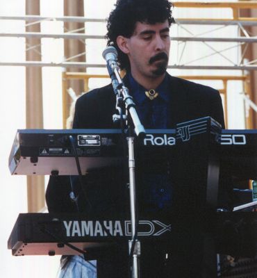 Here's Carlos Garza as a young singer and musician.