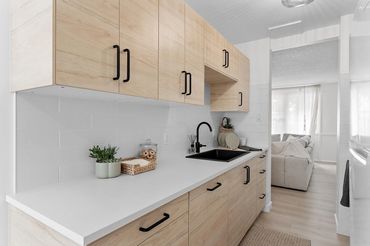 Blonde ash oak gallery kitchen.