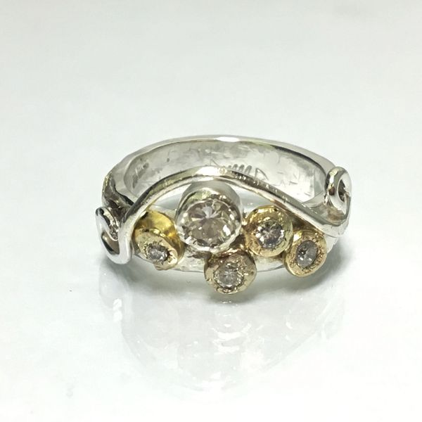 She wanted a new ring using her mother's engagement ring diamonds.