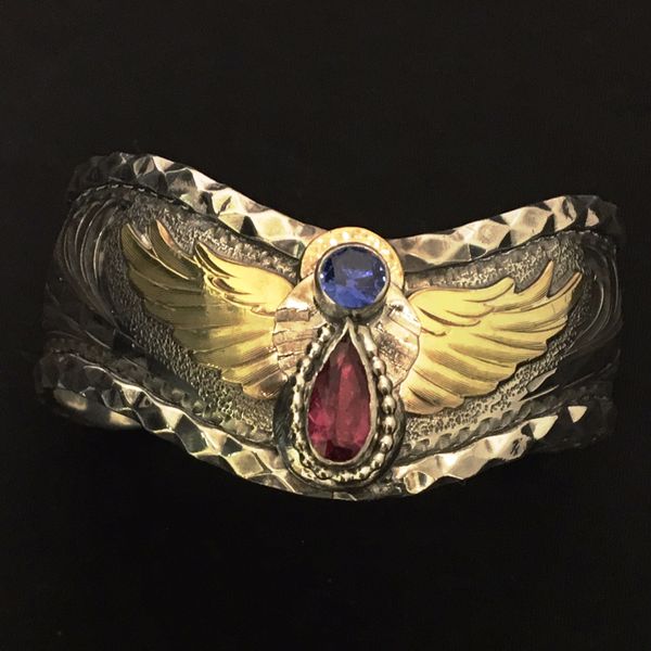 Father gave daughter her mother's HD cuff, I added gemstones to make angel.
