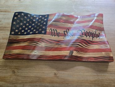 Handcrafted wooden American flag wall art.