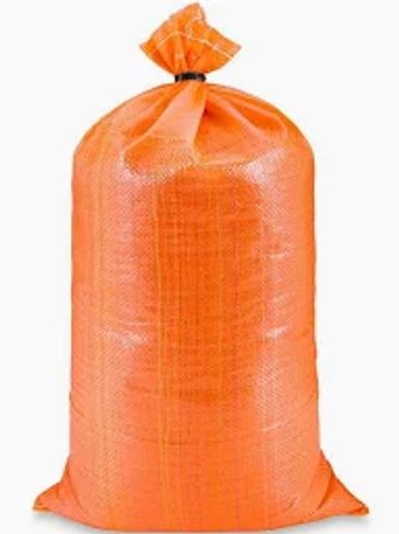 A large orange woven plastic sack tied at the top.