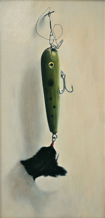 A painting of a green fishing lure with black feathers over hook hangs on a white wall