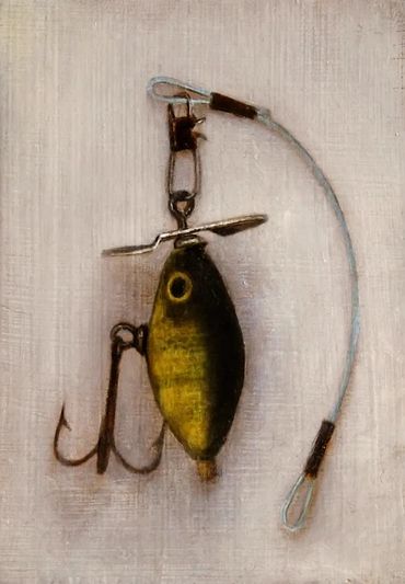 Painting of small spinner lure hanging on white wall