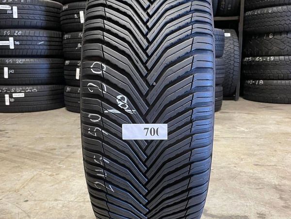 Close-up of a tire with a distinct tread pattern.