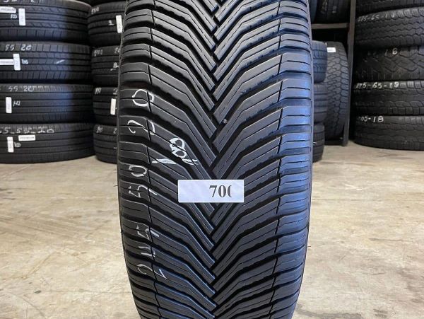 Close-up of a tire with a distinct tread pattern.