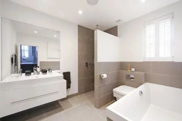 The after shot of the bathroom in the earlier built extension all completed by MCS