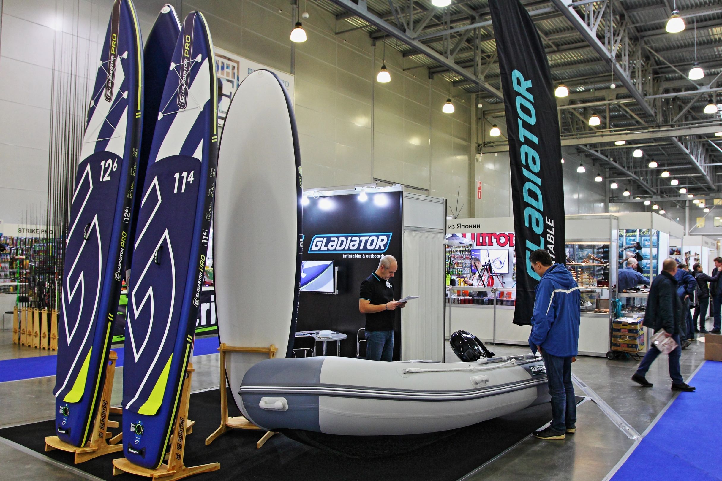 Onsite managers overseeing operations at a tradeshow booth.