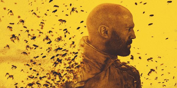 An actor surrounded by Bees on a solid colour background