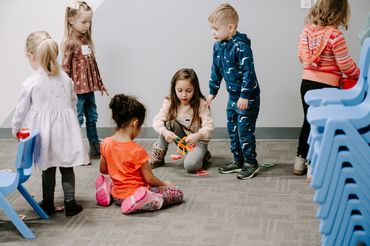 A group of Champion Life Church youth playing a game during Sunday School