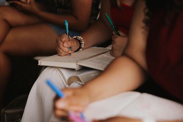 People writing notes during the sermon