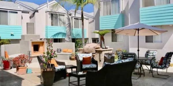 Cozy outdoor seating area in an apartment complex courtyard.