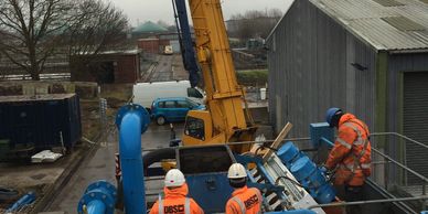 a crane installing large machinery