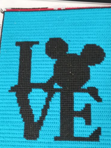 Mickey mouse Love. Hand sewed by my wife. Please allow 4 weeks for it to be made and delivered.