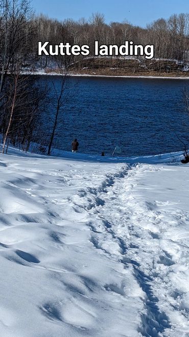 Man fishing with his best friend at Kuttes Landing in Pelland