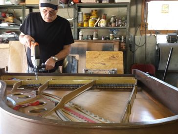 Our Craftsman, Don, restoring a vintage piano