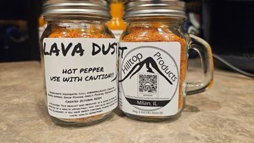 Two jars of Lava Dust hot pepper seasoning from Hilltop Products, Milan, IL.