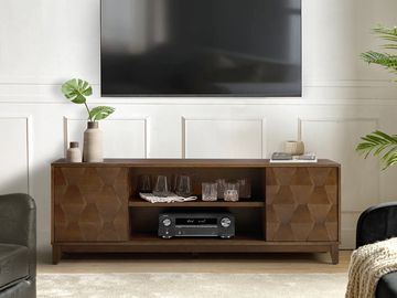 Modern living room with wooden TV stand and mounted flat-screen TV.