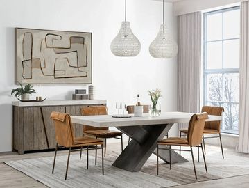 Modern dining room with leather chairs and abstract art.
