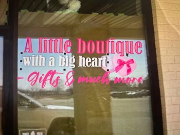 boutique shop with custom window graphics.