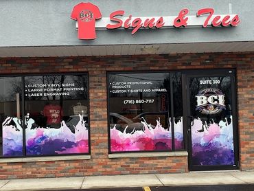 sign and t-shirt shop with custom store window graphics.
