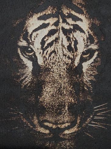 tiger laser engraved on painted canvas