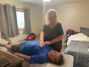 Brenda offering a Reiki session