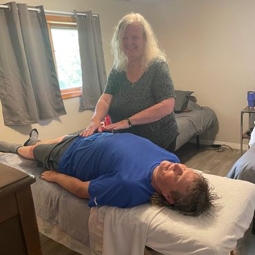 Brenda offering a Reiki session