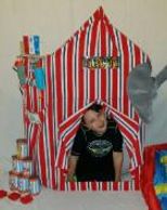 Photo op in our circus prop while theme games are played with a clown for Houston kids