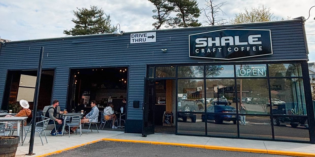 Shale Craft Coffee shop with outdoor seating and drive-thru.