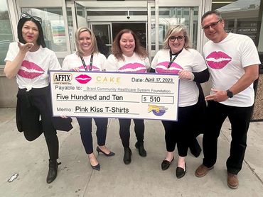 A cheque presentation to the Brant Community Healthcare Systems Foundation by Affix Label and Cake