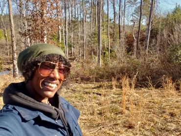 Nature scene. Creek. Trees. Wetland. Black Farmer.