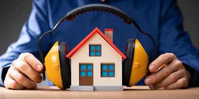 insulated soundproof house with headphones