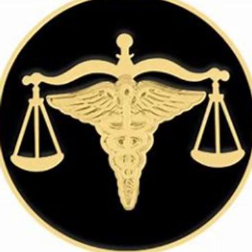 Golden scales of justice with a caduceus symbol on a black background.