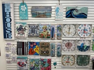 GARDEN FLAGS COASTAL WALL CLOCKS TAG SIGNS HANGING SIGNS COASTAL WALL GIFT SHOP HUNTINGTON BEACH