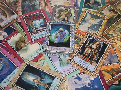 Angel Tarot Cards for an Angel Card Reading.  An array of cards featuring angels and words.