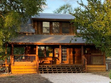 Cabin, Office, Laundry, Bath, Mailroom at Cedar Bend RV Park in Bertram Texas. Full Hookup RV Sites