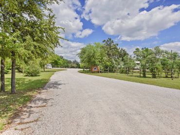 Entrance at Cedar Bend RV Park in Bertram Texas. Beautiful Trees, Pet and Family Friendly