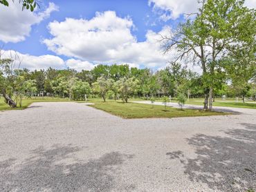 Site 11 and 12 at Cedar Bend RV Park in Bertram Texas. Large Level Sites. Big Rig Friendly
