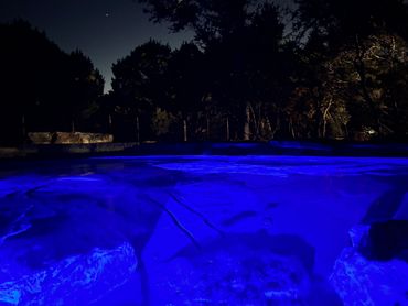 Pool and Spa Under the Stars at Night Cedar Bend RV Park Bertram Texas