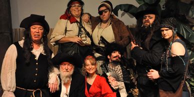 A group of people dressed in pirate outfits at Watson's