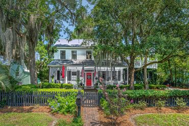 A view of a large property along with so many trees