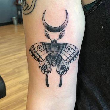 Luna moth black and grey tattoo