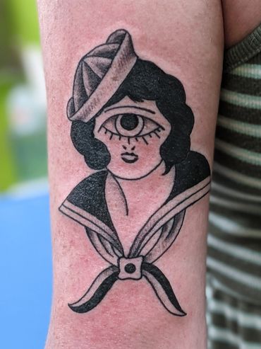 sailor traditional creepy tattoo